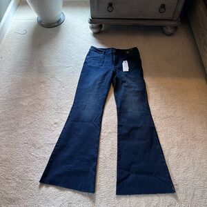EXPRESS - ‘70s Flare Mid Rise FLEXX Jean.  Ultra hyper stretch.  Size L.